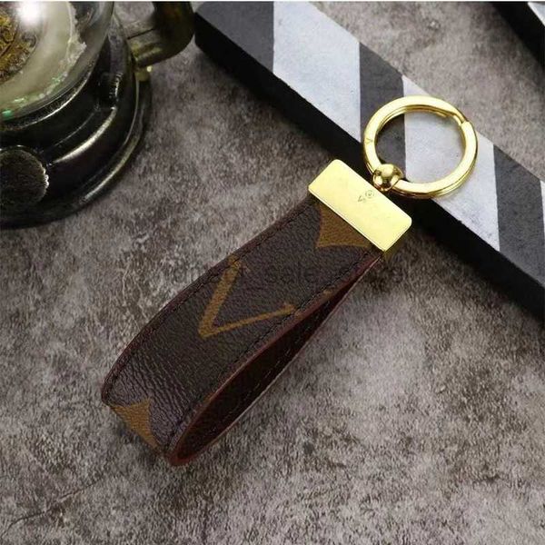 Alças de luxo TOP para celular Charms Alças de grife feitas à mão em couro PU Chaveiro para carro Bolsa feminina com pingente Acessórios