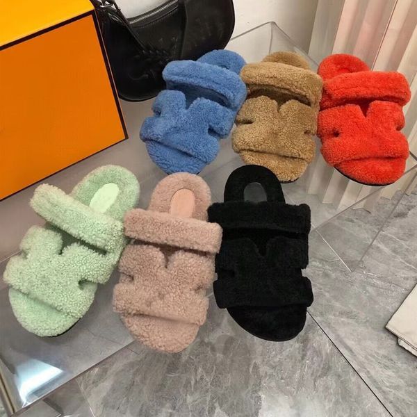 Kış Slipper Moda Tembel Mektup Düz Alt Hotel Sıradan Tapı Tasarımcı Ayakkabı Seksi Lady Karikatür Peluş Peluş Terlik Sıcak Yün Flopları Boyut 35-41-42 Kutu