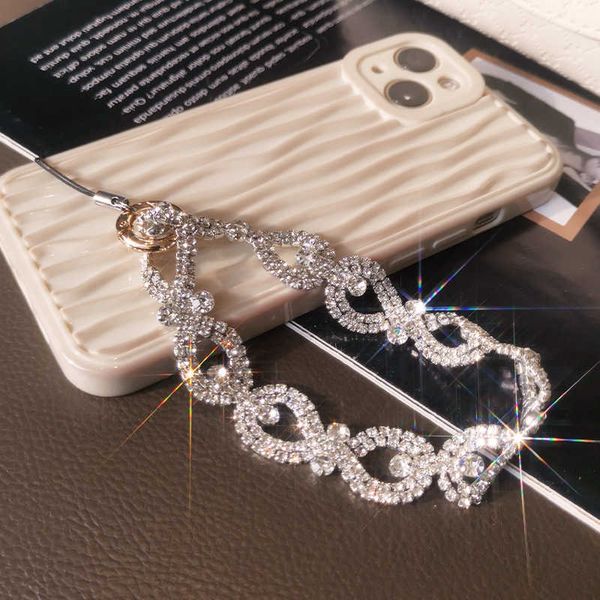 Correias de celular encantos cordão móvel curto luxo strass anel alça de pulso oco para fora corrente portátil caso universal anti perda cordão