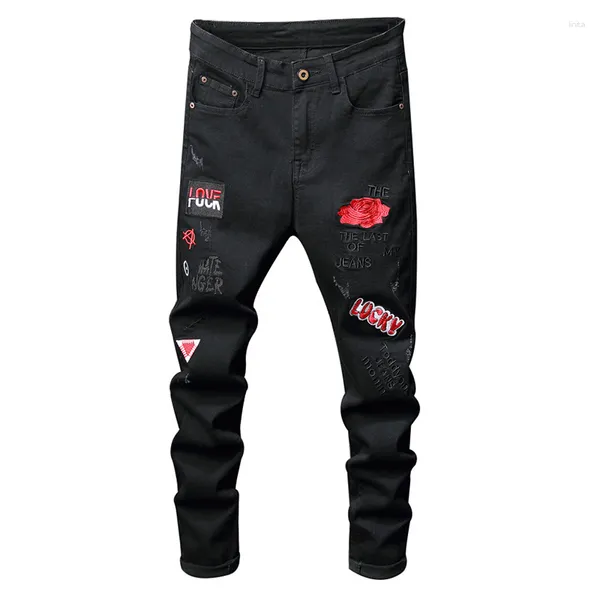 Jeans da uomo con ricamo di lettere di fiori rossi, pantaloni in denim elasticizzato con stemma Fahion nero