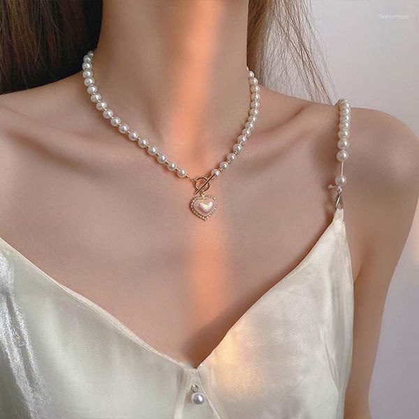 Collane con ciondolo Collana di perle Collare da donna Catena a forma di cuore Gioielli retrò Anello a strozzo Accessori di moda