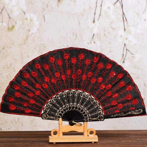 Chinesische Stilprodukte Schöne dekorative Fans Kunststoff Tuch Falten Hand Muster für Party Hochzeit Spanisch Stil Tanz Blume gehalten Fan U1K2