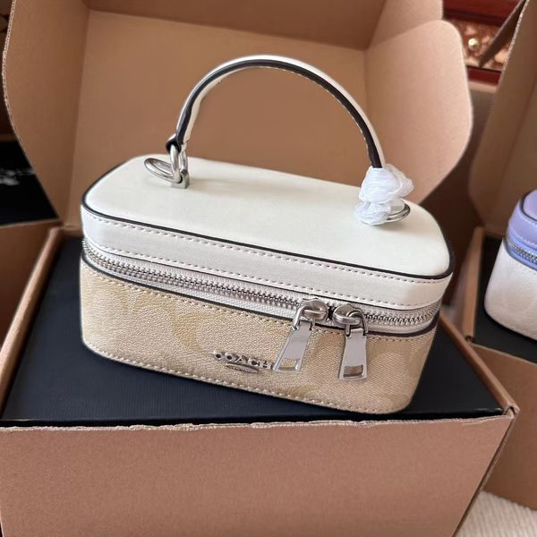 Totes makeup top handle trunk box lunch bag Borse di lusso in vera pelle Pochette moda uomo Borsa a tracolla Cross Body Designer Borsa da viaggio da donna Borse per fotocamera