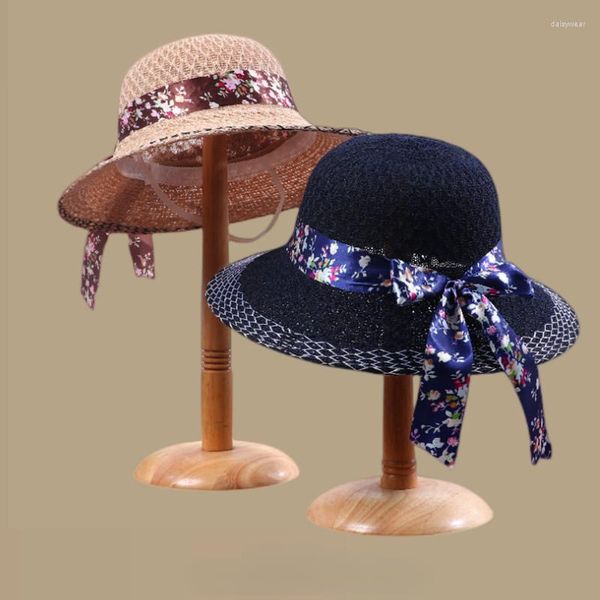 Cappelli a tesa larga Donna Elegante fiocco floreale con fiocco Sole Paglia vintage Protezione da viaggio estiva Brims Abbigliamento Accessori