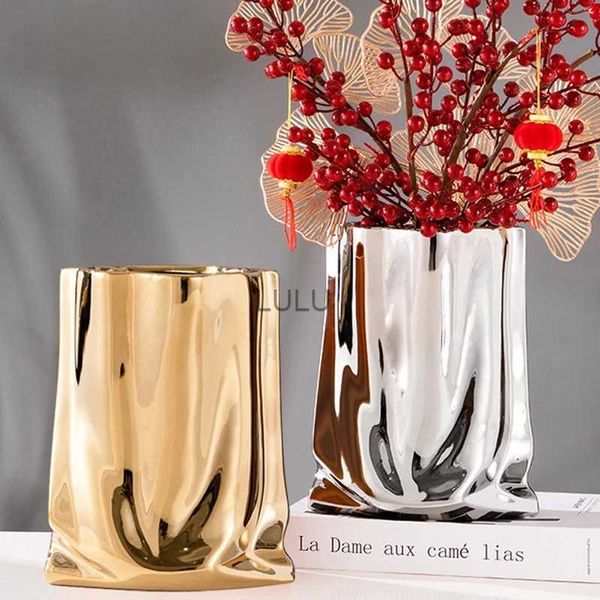 Vaso de cerâmica nórdica Creative Drapeed Saco de pano Design Design de flores Eletroplatação dourada de mobília da cor da cor de prata dourada Decoração da mesa HKD230823