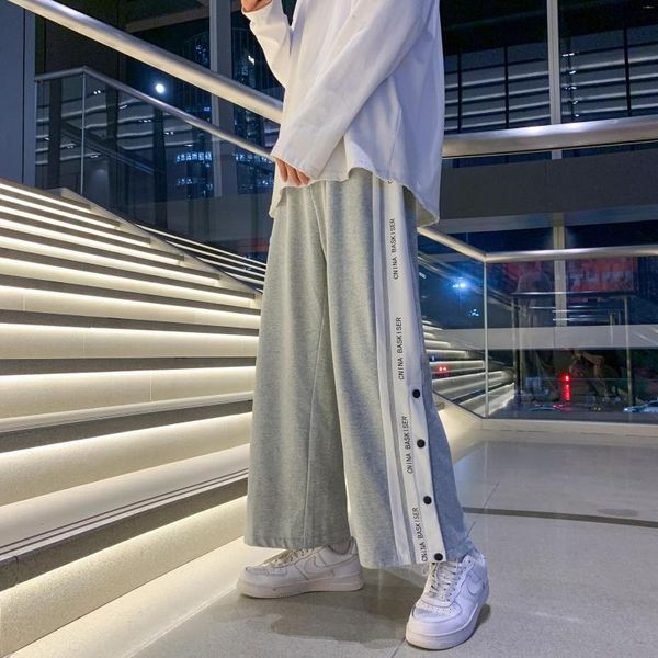 Pantaloni da uomo Streetwear Pantaloni larghi da uomo con spacco laterale Pantaloni sportivi sportivi da skateboard oversize Pantaloni alla caviglia con stampa Harajuku oversize