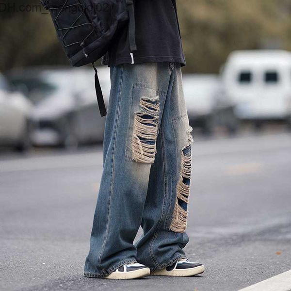 Pantaloni maschili in stile americano jeans strappato da uomo lavaggio estivo e indossare pipi dritti larghi gamba dritta pantaloni di alta strada alla moda z230814