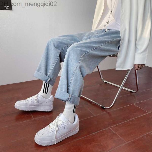 Calça masculina Jeans angustiados Marca de moda masculina elástica cintura Lace Up Student Student New Loose Straight Troushers Street Twist Factory Z230814