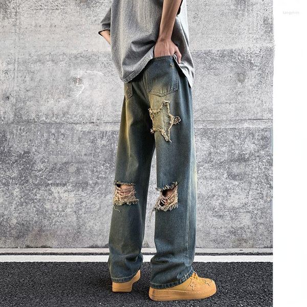 Pantaloni maschili strappati jeans estate tendenza americana retrò in difficoltà e nicchia di nicchia del design delle donne