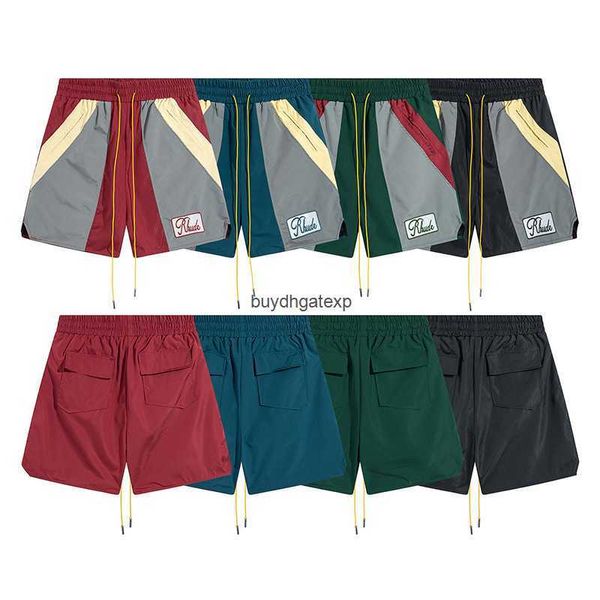 PCGJ Herren- und Frauen High Street Shorts Modemarke Rhude 2023 American English Stickerei Spleiß Casual Sports Lose Viertel Kordelschnelle Trocknungshosen