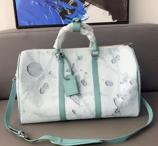 Designer -Tasche Duffelbeutel mit hoher Kapazität Handgepäck mit echtem Leder Handtasche Frauen Reisetasche Männer Klassische Reisetaschen im Freien Taschen im Freien