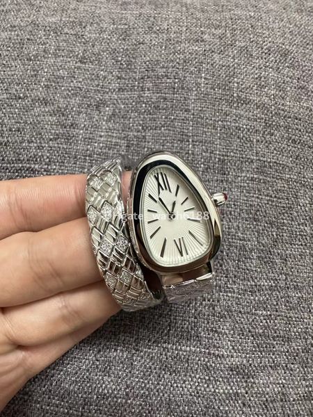 Orologio da donna alla moda con personalità unica abbinata a design a catena rosa con taglio uovo convesso che corrisponde ai polsi snelli da donna in orologi in acciaio inossidabile