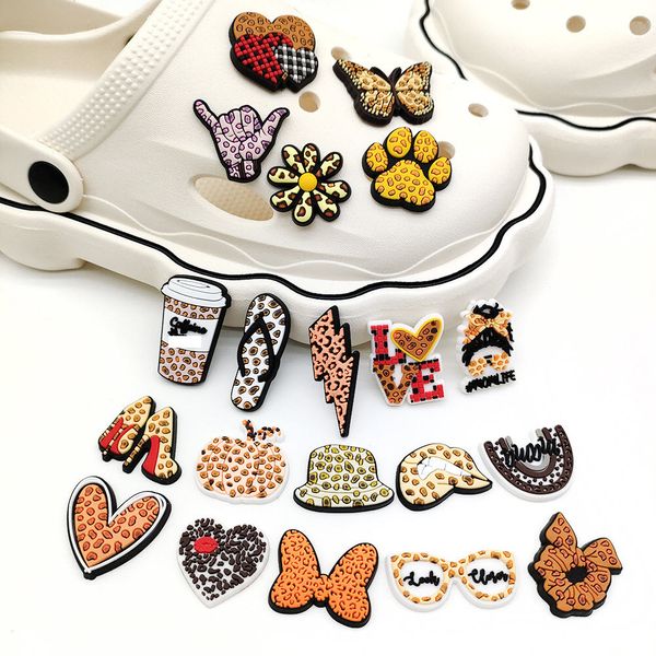 Anime charms wholesale childhood memories leopard hat bow funny gift cartoon charms shoe accessories pvc decoration buckle soft rubber clog charms