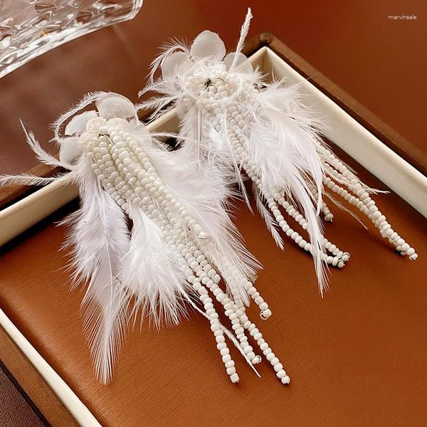 Orecchini penzolanti perline di riso piuma coreano per perle per donne senza foro a orecchio clip di stile di moda personalizzato di gioielli da sposa bianca