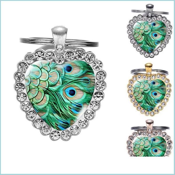 Schlüsselanhänger Lanyards Ethnisch grüne Boho Peacock Feder Glass Art Heart Heart Keychain Handmade Schmuck Top Grad Metallschlüsselringhalter 4 Col Dhl2e