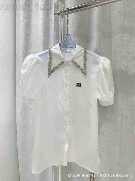 Designer de camisas de blusas feminina nova camisa de manga curta com bolha decorativa de diamante de colarinho pólo com um efeito de ombro de ângulo reto perfeito com efeito de ombro reto