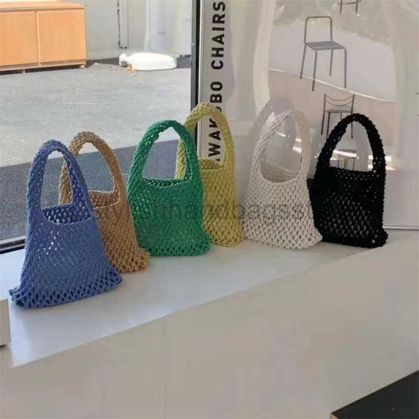 Bolsas de ombro primavera e verão novo puro malha de algodão corda oco para fora do estilo bolsa de fotografia fresca bolsa colorida de bagstylishhandbagsstore