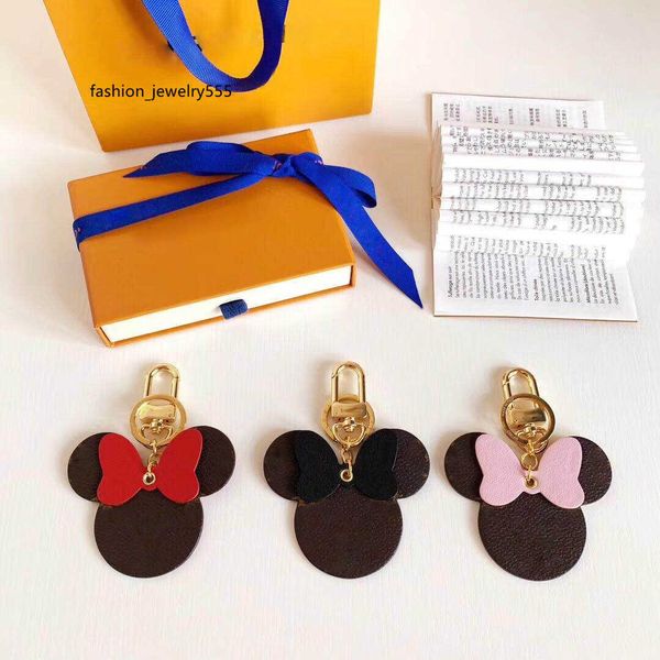 Keychains Lanyards Neue Designerschlüsselkette mit Staubbag -Box Mono Accessoires Key Ring Leder Brief Muster Weihnachtsgeschenk an ihren luxuriösen Geldbeutelanhänger