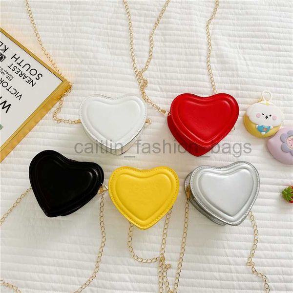 Cross Body Body's Children's Heart Mini Bag del 2023 Summer Nuova catena di colori caramelle una borsa a tracota Yangqikou Rosso Borsa Caitlin_Fashion_Bags