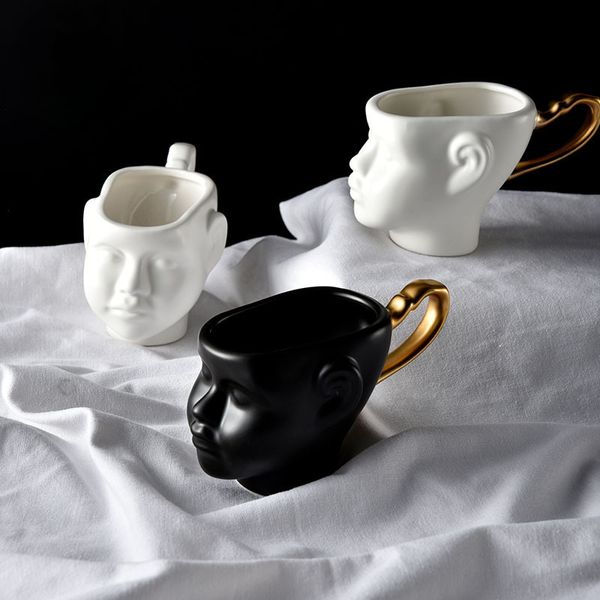 Canecas decoração nórdica decoração criativa forma de face copo de porcelana e pires de cerâmica simples conjuntos de chá de design moderno xícaras de café 230815