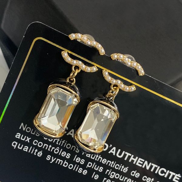 Designer de luxo Geometria Coração Punto de alta qualidade feminino Brincos de marca de marca de cobre material de pérola cristalina gota de rolagem de 18k jóias de natal banhadas a ouro