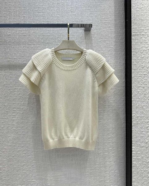 Frauenpullover kurzärmelig gestrickter Sweater. Dreidimensionale Lotusblatthülsenkantenmodellierung verlegen feen- und intelligent