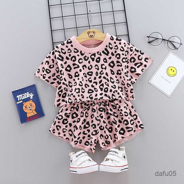 Set di abbigliamento per ragazzi femminile leopardo stampa in cotone per bambini set di abbigliamento per bambini Summer Neonato Sport 2 pezzi Set di abiti da ragazza set R230816