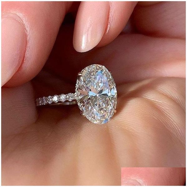 С боковыми камнями европейская американская модная блестящая овальная бриллиантовая обручальное кольцо элегантное кубическое цирконии