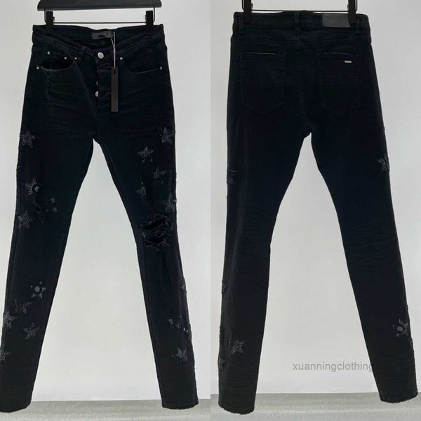 Herrendesigner Jeans Star zerrissen Jean Man Slim Reißverschlusshose für männliche Stretchhose Cashewblumenflecken Denimhose Schwarze Frachthose RVY4