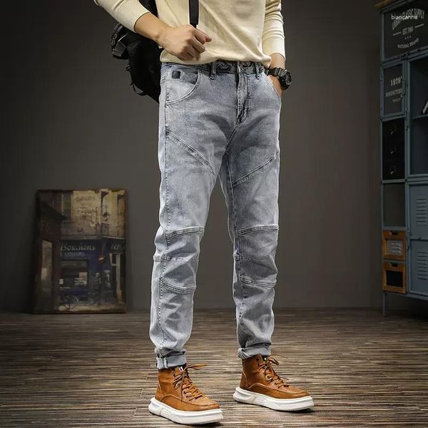 Jeans masculinos Moda de streetwear Men retro azul claro exagerado moto splicado Homme Hip Hop Calças elásticas vintage calças vintage