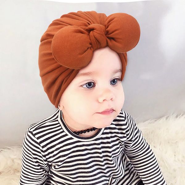 M611 New Infant Baby Girls Cotton Hat Hat Bowknot Headwear Candy Color Criança Criança Crianças Feijas Turbano Chapé