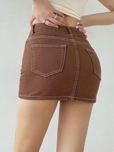 Юбки сексуальные телевизионные телевизионные острой девушки, обернутая джинсовая джинсовая ткань, наполовину юбка женское дизайн чувства средней талии тонкая четкая нить мини -короткая QD1U