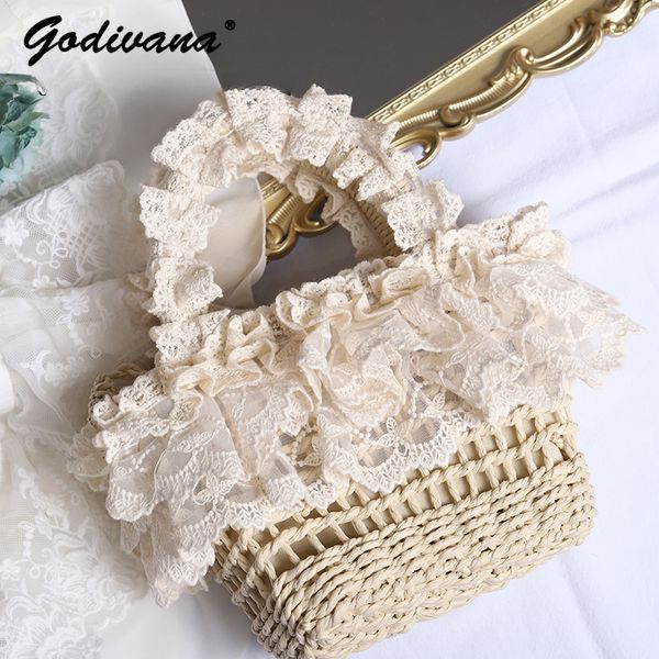 Kosmetiktaschen Hüllen Stroh Handtasche Original handgemachte Lolita Französisch Pastoral Stil Spitzenkante Mori Mädchen Strand gewebte Tasche weiblich 230817