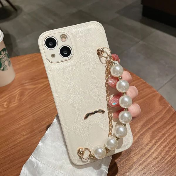 Fashion Women Phone Case Cint per il polso perle per iPhone 14 Plus 13 Promax 12 Pro 11 XS XR XSMAX Copertina di telefoni in pelle Cover Bracciale Custodia per iPhone