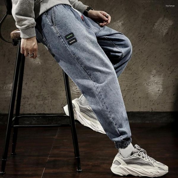 I pantaloni da uomo si restringono gli uomini chic resistenti a tasche multische