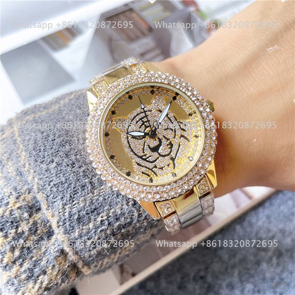 Brand Watches Männer Frauen Tiger Diamond Style Metal Steel Band mit Luxus -Logo Quarz Handgelenk Uhr RO 206