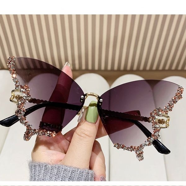 Schmetterlingsgeformte diamantgelobte rahmenlose Sonnenbrille für Frauen modische Sonnenbrille