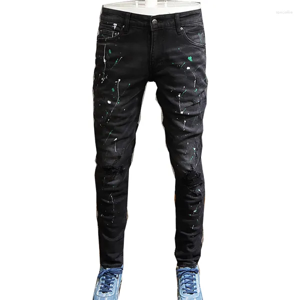Herrenhosen Modehoft Street tragen schwarze dünne, zerfetzte Jeans Punk Designer Hip Hop