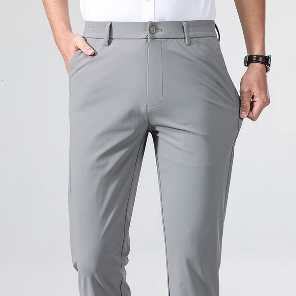 Calças masculinas 2023 Summer Casual Men Sportswear Sportsable respirável Rápido Nylon LODO LONCO PANT STILHO GOLF PLUS