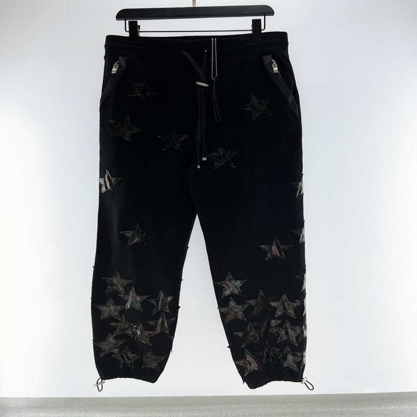 Pants casuais de calças casuais homens calntsl camuflagem de couro pentagrama feminino feminino de pista de moda hip hop