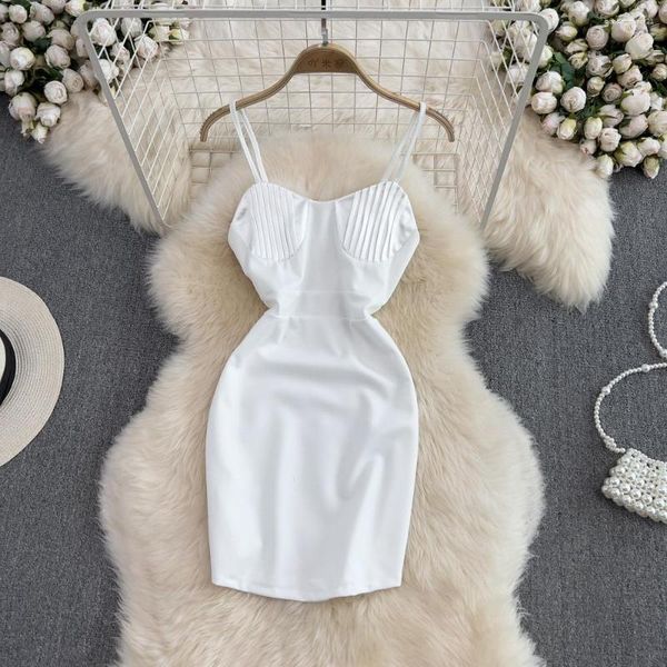 Lässige Kleider reine sexy Hosentender Kleid 2023 Sommer Ärmelose exponierte Rückenpackung Hip Mini Kurzer weißer schwarzer Spaghetti -Gurt