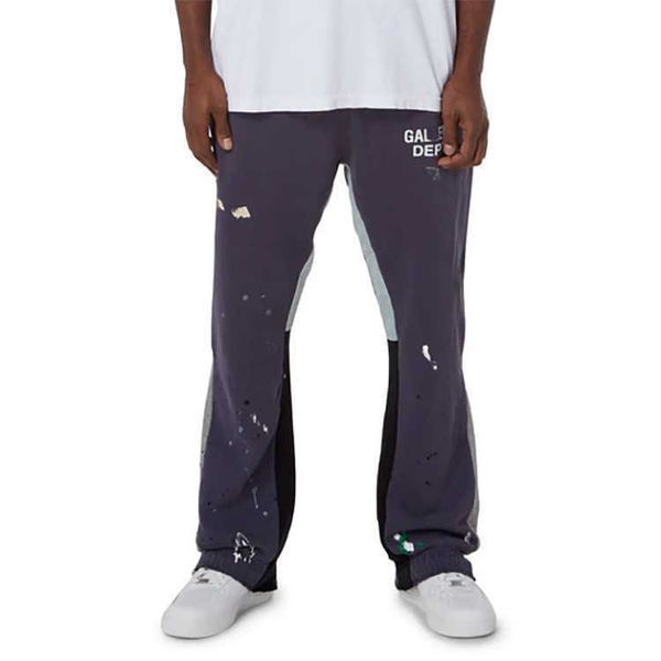 Pantaloni sportivi da uomo Designer Dipartimento Pantaloni sportivi in cotone Lettera Jeans Dipinti a mano Spruzzi di inchiostro cuciti e protezione con coulisse da donna High Street