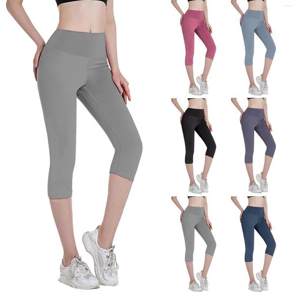 Pantaloni attivi Capri Yoga da donna con tasche con un allenamento in vita alto per l'allenamento