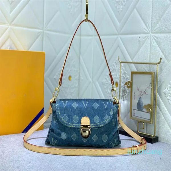 Omuz çantası tasarımcısı lüks el çantası kadınlar debriyaj retro çanta denim kumaş çanta deri çanta baskılı bayan günlük çanta crossbody çanta