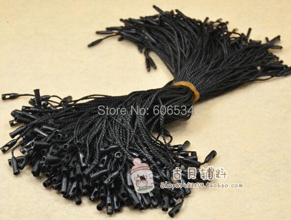 Astucci in stock testa di proiettile appendere corde per abbigliamento Cordoncino di chiusura con sigillo di buona qualità per indumento 1000 pezzi / lotto 230826