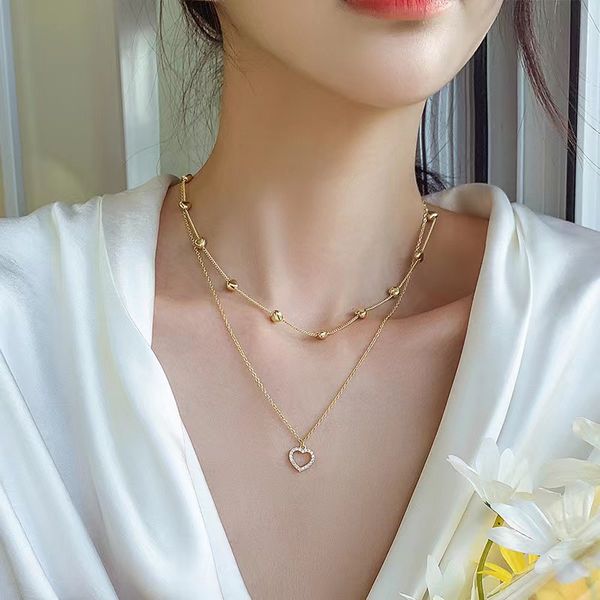 Мода Новый золотой Цвет Двойной слой сердечный ожерелье для женщин Ключица Элегантное очарование свадебной кулон