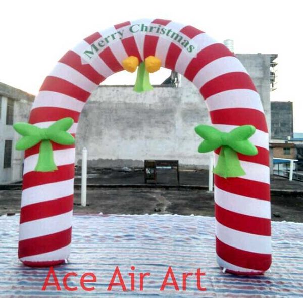 wholesale 10x6m 33x20ft con ventilatore Bellissimo arco gonfiabile di bastoncino di zucchero natalizio per la decorazione natalizia made in China