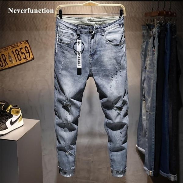 Männer New Ripped Casual Skinny Jeans Hosen Mode Marke Mann Streetwear Brief gedruckt Distressed Loch grau Denim Hosen 201123271r