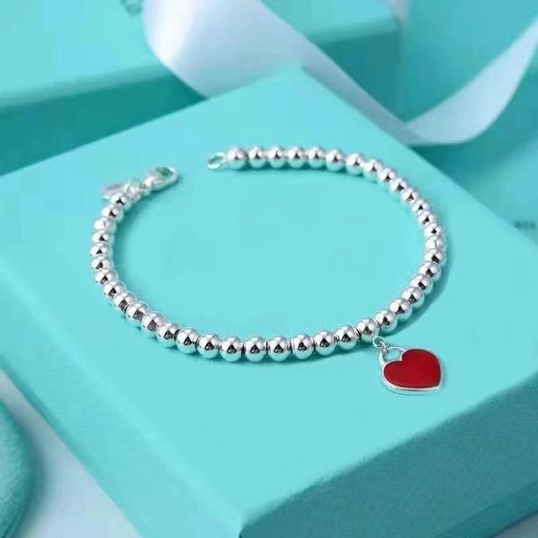 Ciondolo cuore bracciali di perle fili di perline per le donne stile retrò luce di lusso alla fibbia alla moda elegante