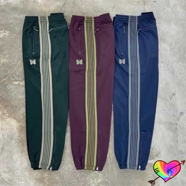 Pantaloni da uomo 2022 Pantaloni a matita con aghi Uomo Donna 1 1 Pantaloni con aghi con cerniera per gambe di alta qualità Pantaloni con doppia striscia ricamati a farfalla T230302